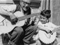 Agisilaos Cacaviatos and his grandson playing musical instruments, 1964