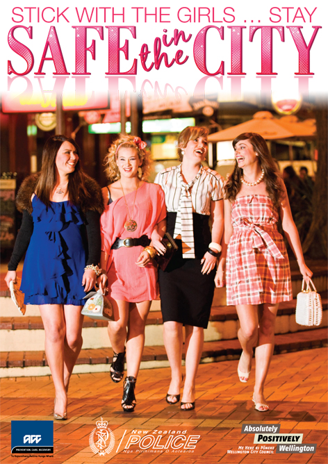 Four women laughing and smiling under pink text Safe in the City