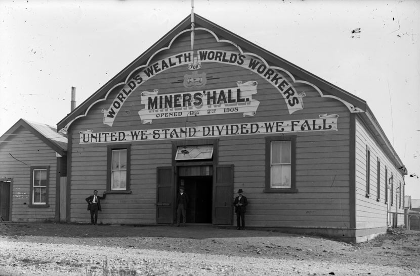 Hall with Worlds Wealth World's Workers over sign Miners' Hall'