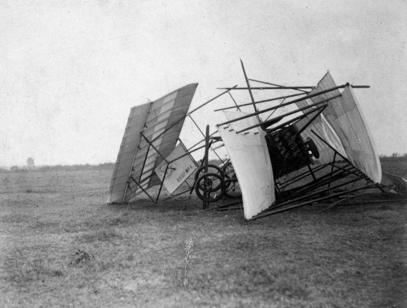 A photograph showing the aeroplane Manurewa with the wings broken off and the entire structure collapsed