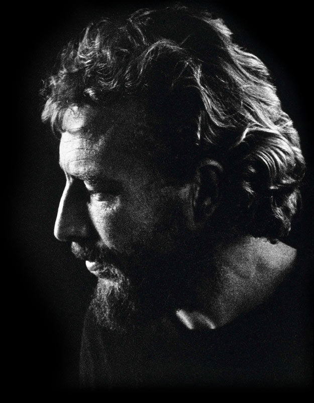 A black and white head and shoulders photograph of Ted Smyth in profile