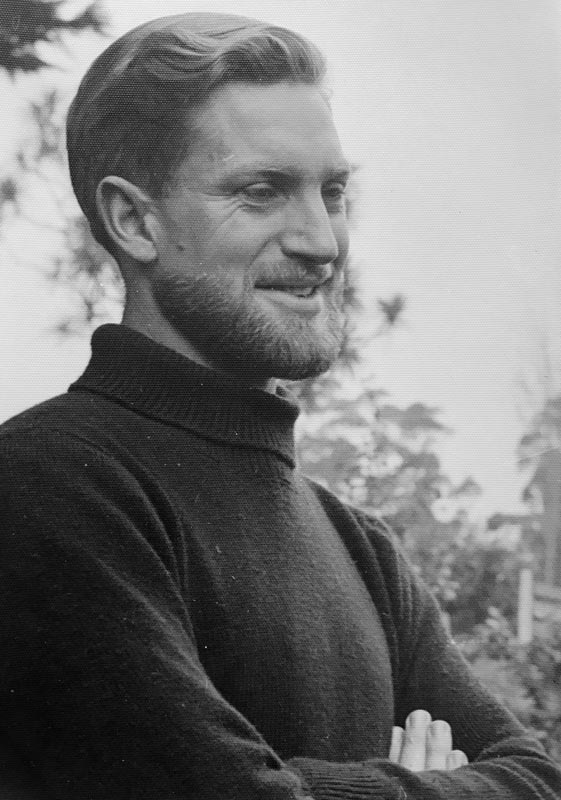 Head and shoulders portrait of Harry Turbott as young man, bearded and wearing a turtleneck sweater. 