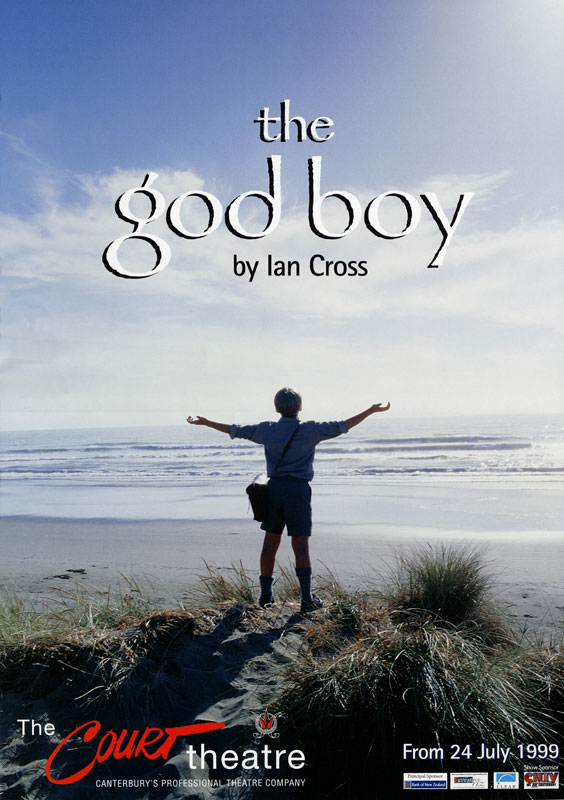 A colour poster showing a boy in school uniform standing on a beach, arms outstretched.