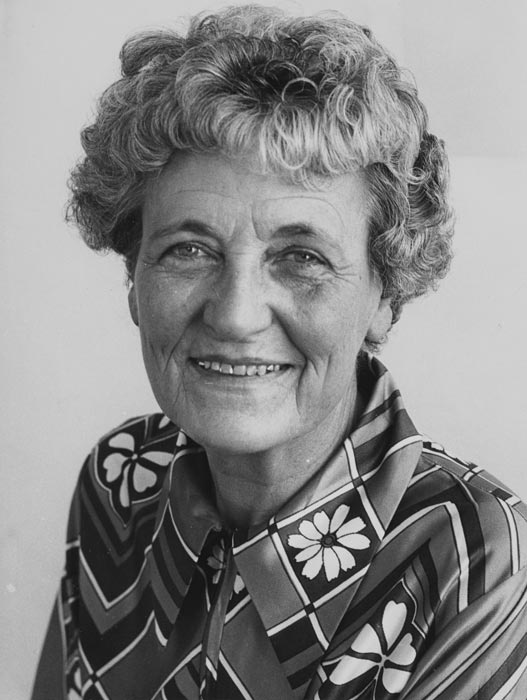 A head and shoulders studio portrait of Mavis Davidson as an older woman. 