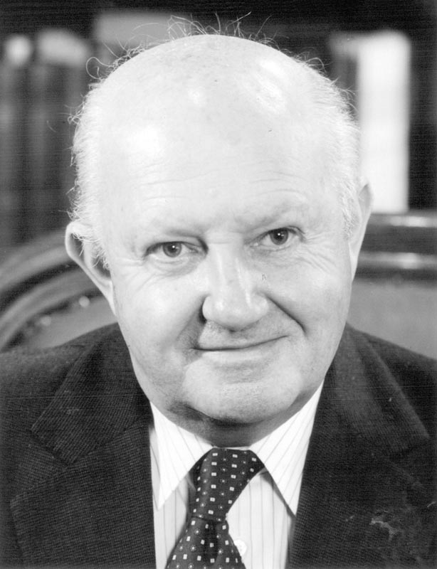 A head and shoulders portrait of Owen Woodhouse in middle age.