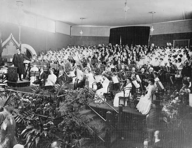 Alfred Francis Hill, conducting in 1906