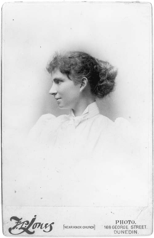 Studio portrait of Mabel Hill in profile
