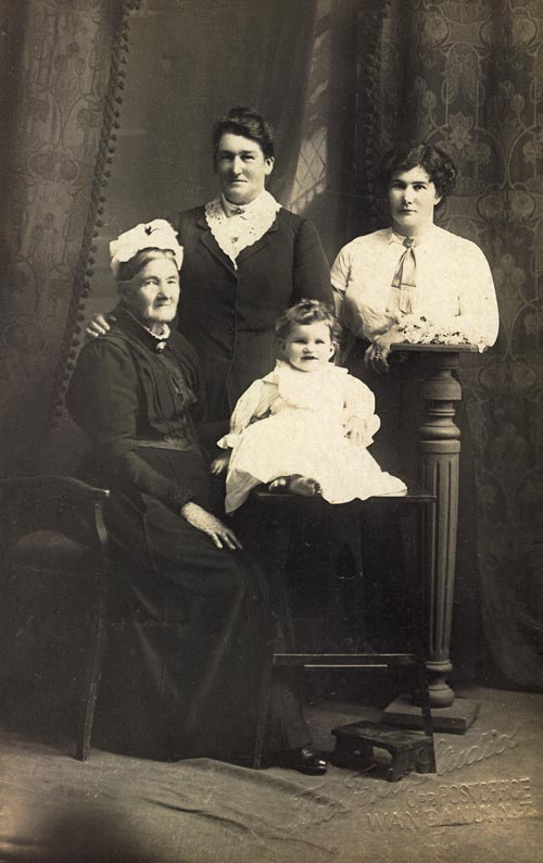 Fanny McHugh (standing, centre) with her daughter Gladys (right), mother Margaret (left) and baby granddaughter Frances