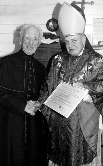 Nicholas Moore (left) and Bishop O. N. Snedden