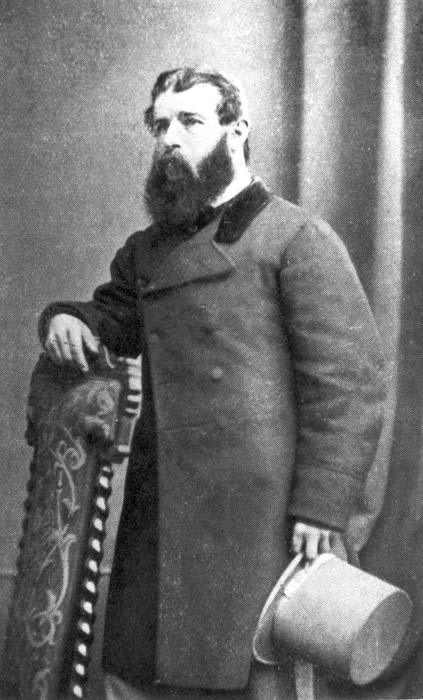 'Popular, amusing eccentric' Henry Poingdestre, holding his trademark white bell-topper