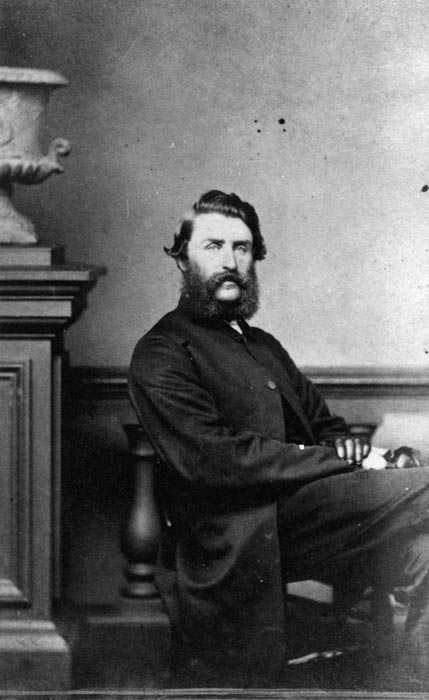 A mid Victorian studio photograph of a seated James Stack