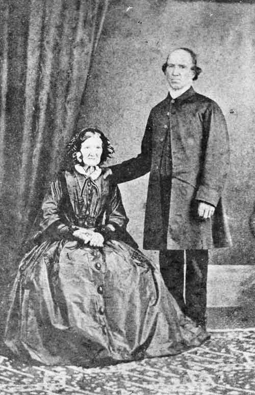 William Whiteley standing next to the seated Mary Ann, both formally dressed