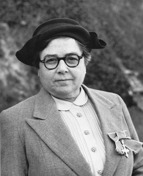 Grace Widdowson wearing her OBE decoration, about 1951