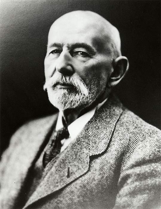 Frederic Williams in later life; bald, moustatchioed, well-dressed.