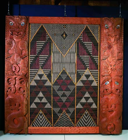 Kupe carving and tukutuku panel