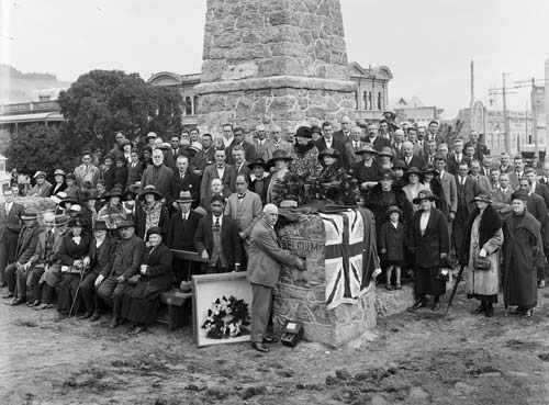 Placing soil at a war memorial