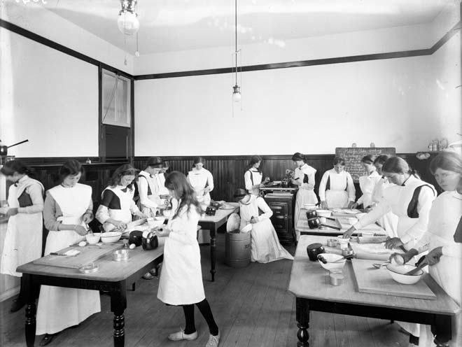 Schoolgirls learn cookery