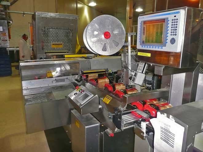 Slicing and wrapping machine