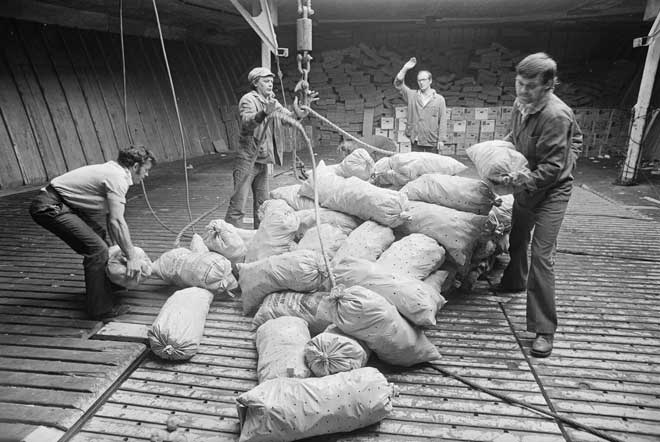 Russian fishermen loading supplies 
