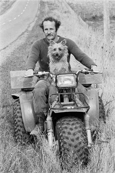Man, dog and bike