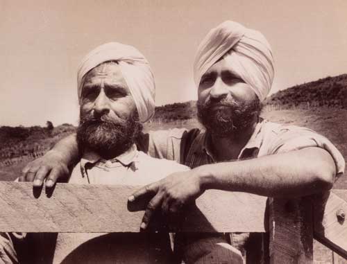 Two men in Indian head wear