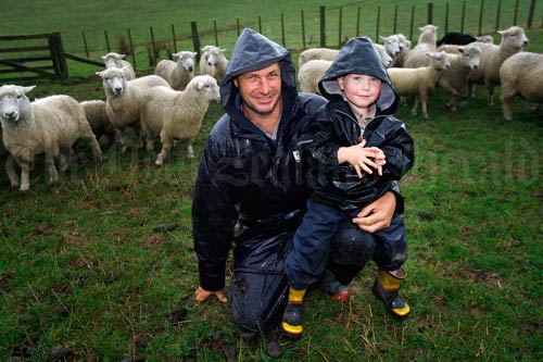 Farmer dad and son