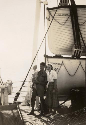 Couple with baby on ship