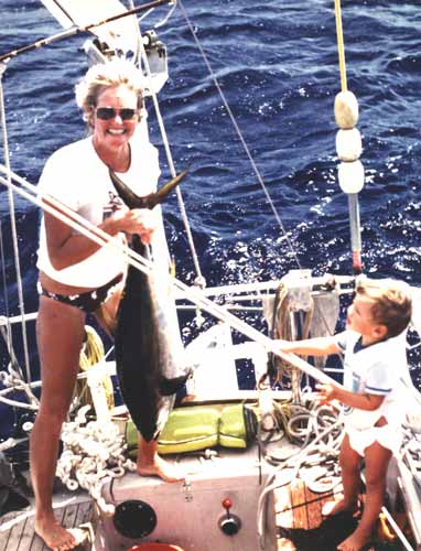 Woman and young child on yacht at sea