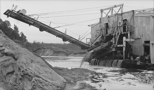 Dredge at work, Gillespies Beach