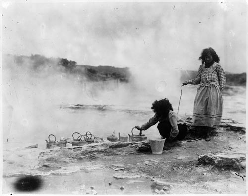 Māori women cooking at Whakarewarewa