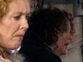 Two women prepare for the rush when opening a garage sale
