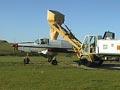 Fertiliser loader and topdressing aircraft