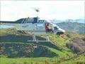 Topdressing by helicopter