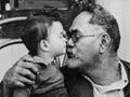 Māori grandfather with grandchildren