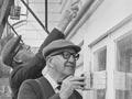 Arnold Nordmeyer painting a Presbyterian manse