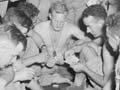 Playing cards on a troopship, 1943