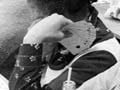 Playing housie, 1975