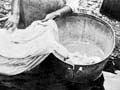 Washing in a river, 1906