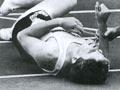 St John officer treating an athlete, 1989