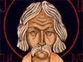 Head of long-haired man with moustache