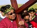 Religious observance: Carrying the cross