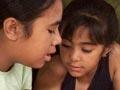 The Aukuso family learning Samoan