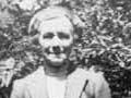 Noeline Baker in her garden at Moturau Moana, Stewart Island, about 1953