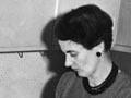 Home science tutor Emily Elizabeth Carpenter in a demonstration kitchen, 1956