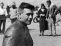 Percy Coleman on a Royal Enfield motorcycle, Waikanae Beach, about 1930
