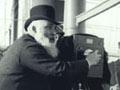 William Fitzgerald Crawford taking a photograph, 1897