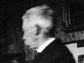 William Mathew Hodgkins painting in his studio, about 1896