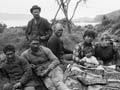 Wellington Harbour pilot William Shilling (back) and others in an informal photograph taken at Karaka Bay