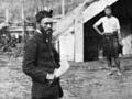 Prophet  Te Mahuki (centre, wearing European dress) and others at their community Te Kumi, north of Te Kūiti