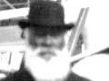 Hirini Te Rito Whaanga, bearded and wearing a hat. 